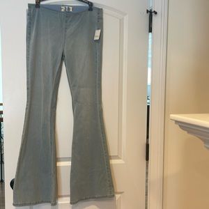 Free people we the free pull on stretch denim flares